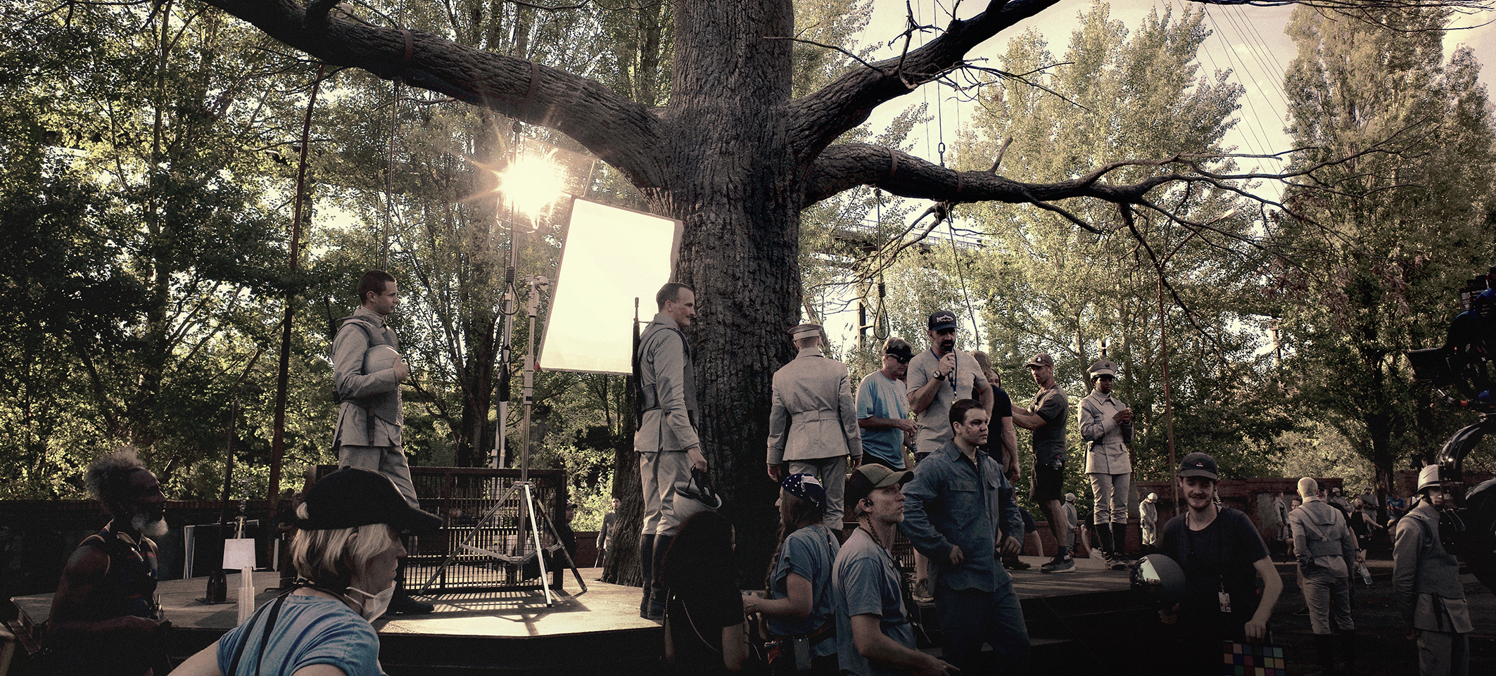 Set photo of the hanging-tree scene in District 12, The Hunger Games: The Ballad of Songbirds and Snakes
